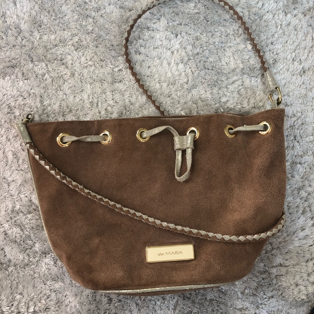 Light brown suede crossbody bag with silver lining